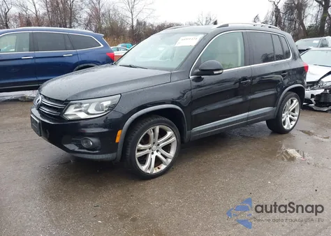 2013 Volkswagen Tiguan Sel из США, поврежденный, VIN WVGAV7AX9DW528418